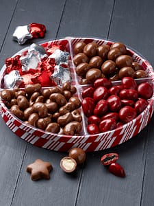 Round Candy Stripe Sampler Tray filled with 4 assorted chocolates