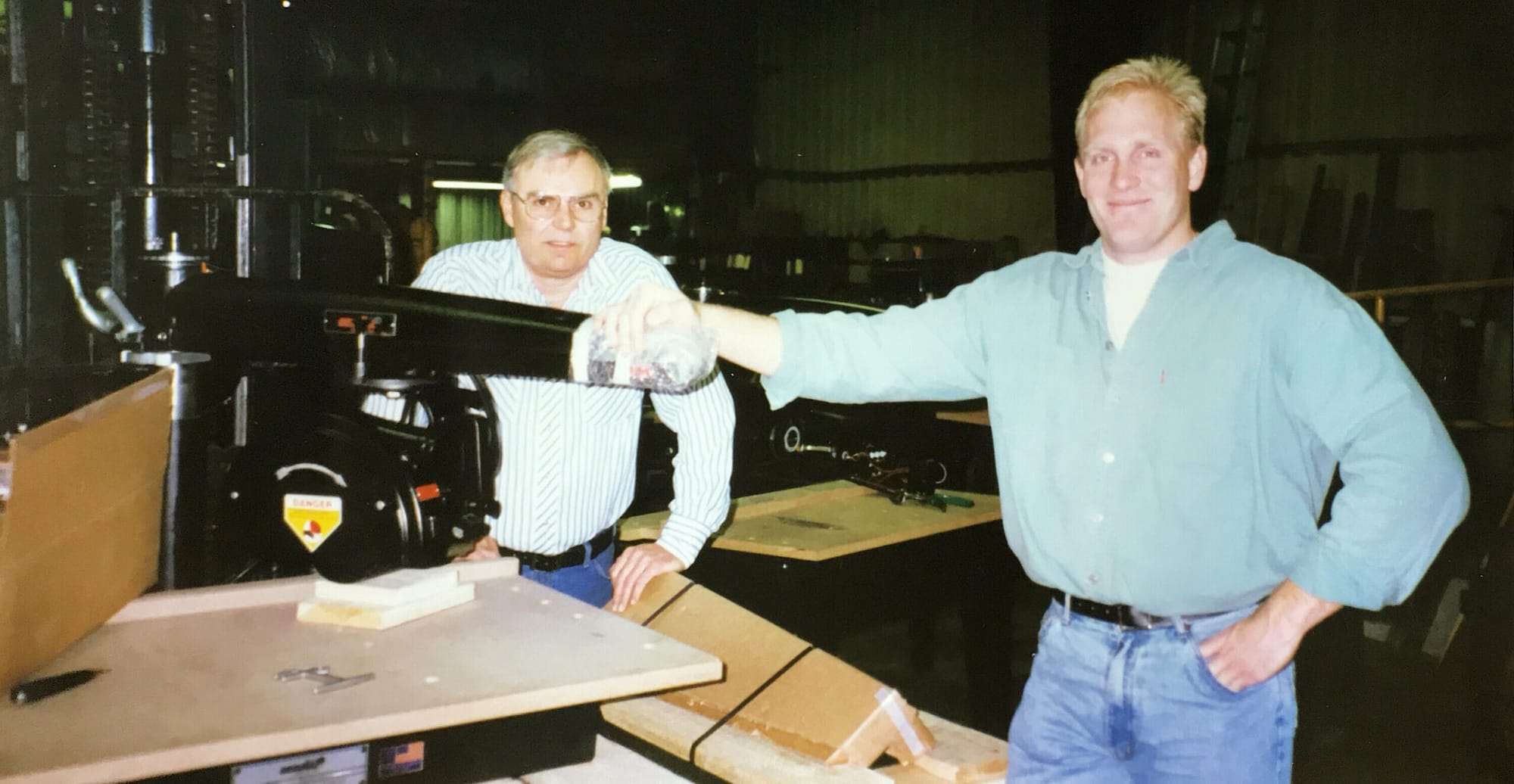 Robert and Allen show off the first 12" Contractor Duty Radial Arm Saw built at the Original Saw Company.