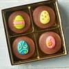 4 chocolate covered sandwich cookies with easter eggs