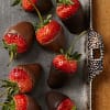 Tray of milk and dark chocolate covered strawberries