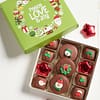 Green Holiday Binge box filled with an 11pc chocolate assortment of caramels, cookies and foiled stars.