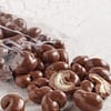 clear bag of milk chocolate covered cashews