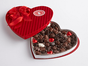 Red Heart Shaped Box filled with assorted chocolates