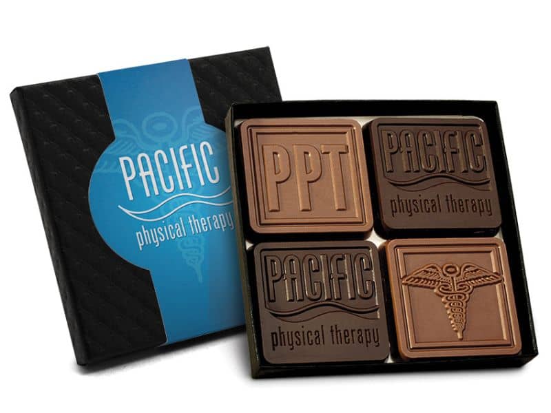 4 piece logo chocolate box assortment with box and chocolates